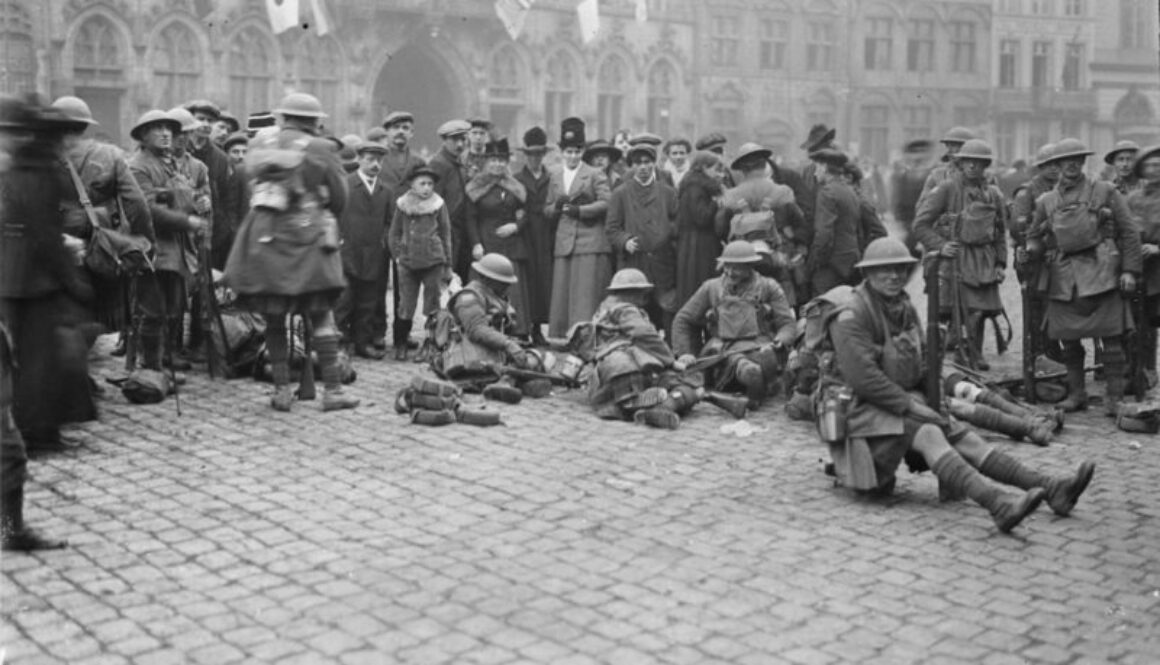 277_42nd Battalion resting in the Grand Place, Mons, on the morning of the 11th november, 1918 2